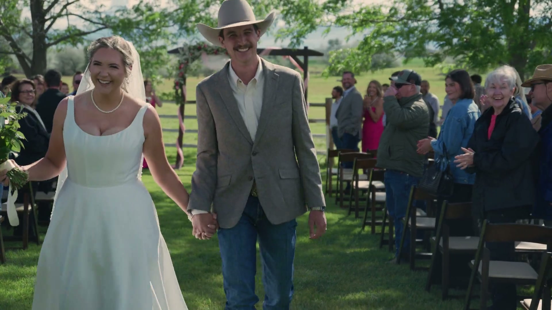 Bride and groom walking down the aisle at an Idaho Falls wedding